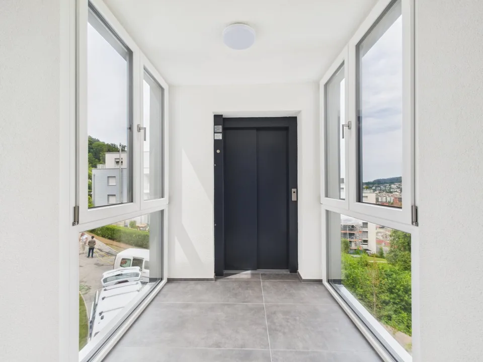 Appartamento 2.5 locali con vista lago, città e montagna! – foto 7 di 10