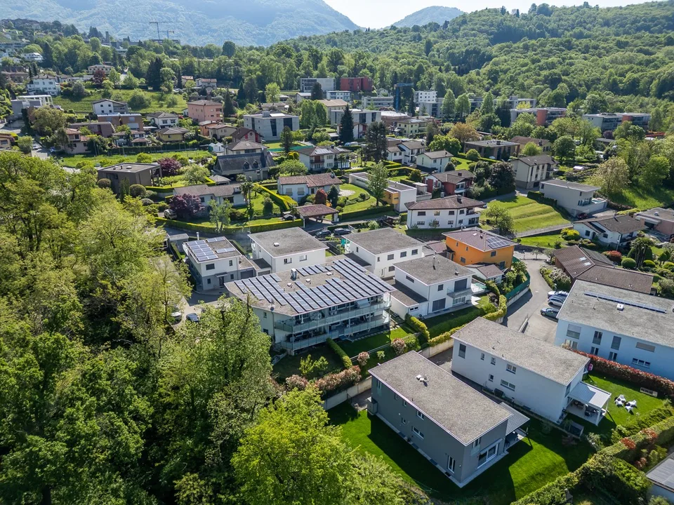 Prächtige Wohnung in Cadempino mit Panoramablick und Garten