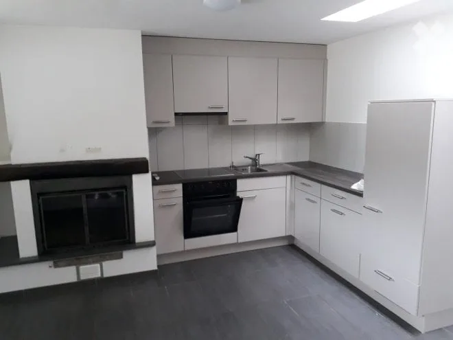 Maison de noyau - 2,5 pièces avec jardin privé et parking