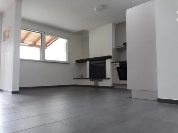 Maison de noyau - 2,5 pièces avec jardin privé et parking