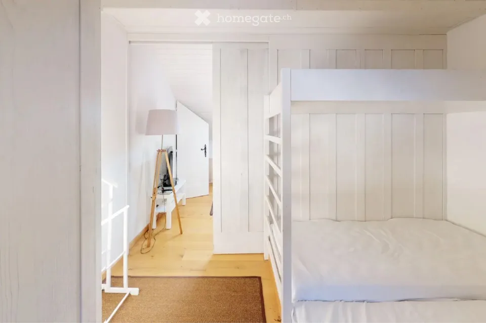 Affascinante duplex di 4 locali con balcone e posto auto