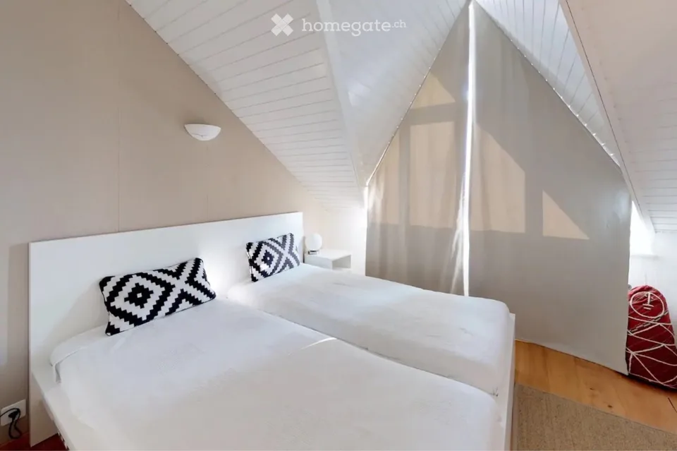 Affascinante duplex di 4 locali con balcone e posto auto