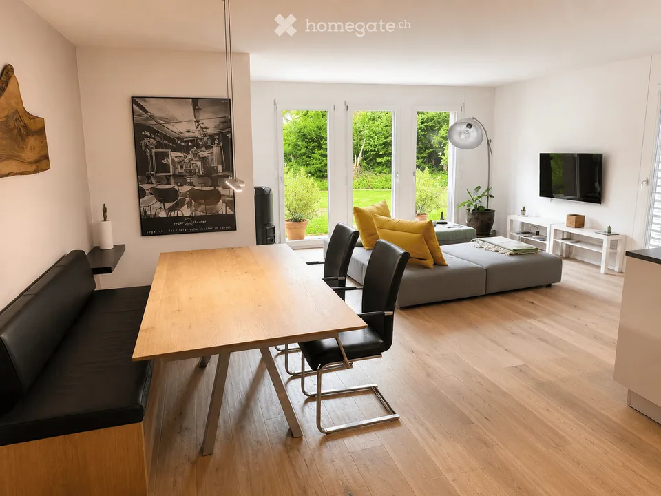 Appartement de jardin moderne 3.5 pièces avec 2 places de parking souterrain et meublé en option