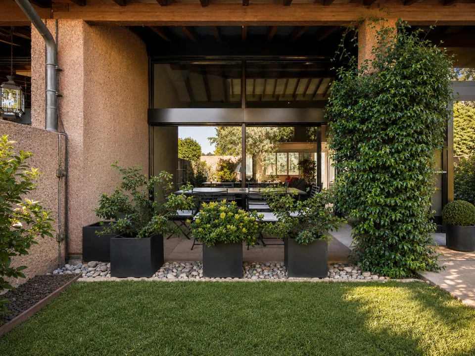 Maisonette su tre livelli e giardino in contesto esclusivo