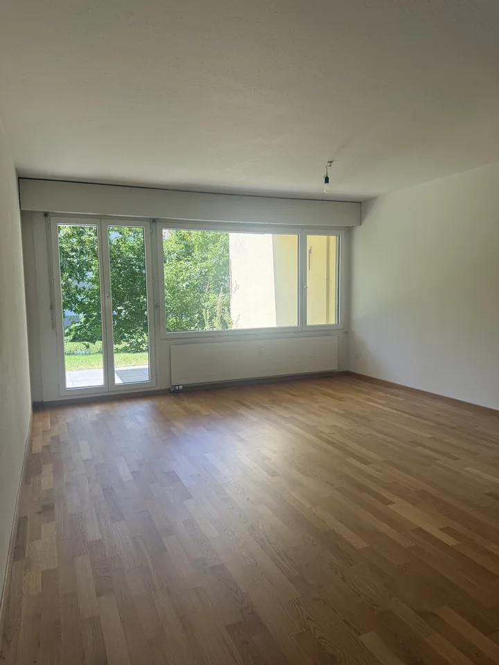 Attraktive 3.5-Zimmer-Wohnung mit gemütlichem Sitzplatz in Speicher