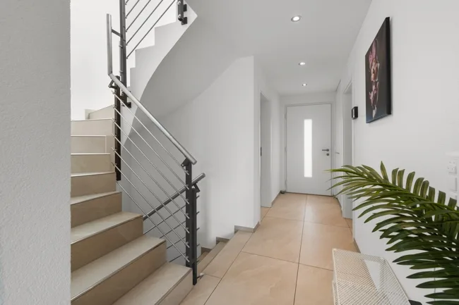 Ambiente di vita con vista panoramica, casa a terrazza con ascensore e giardino