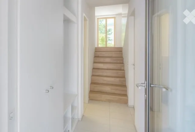 4.5-room row house with garage and 2 outdoor parking spaces directly in front of the house