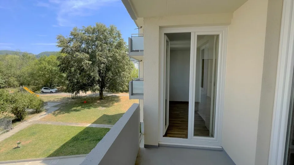 Spacieuse appartement de 3.5  pièces au calme avec balcon, place de parking et bonne accessibilité Kopie