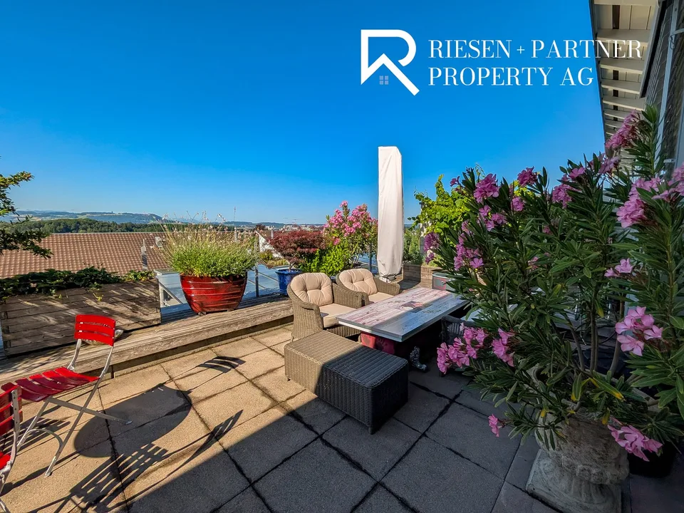 Attic duplex with winter garden and panoramic terrace