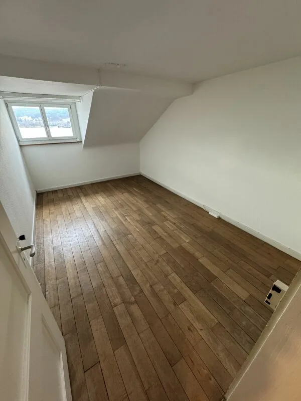 Mansarde-Zimmer mit Seeblick