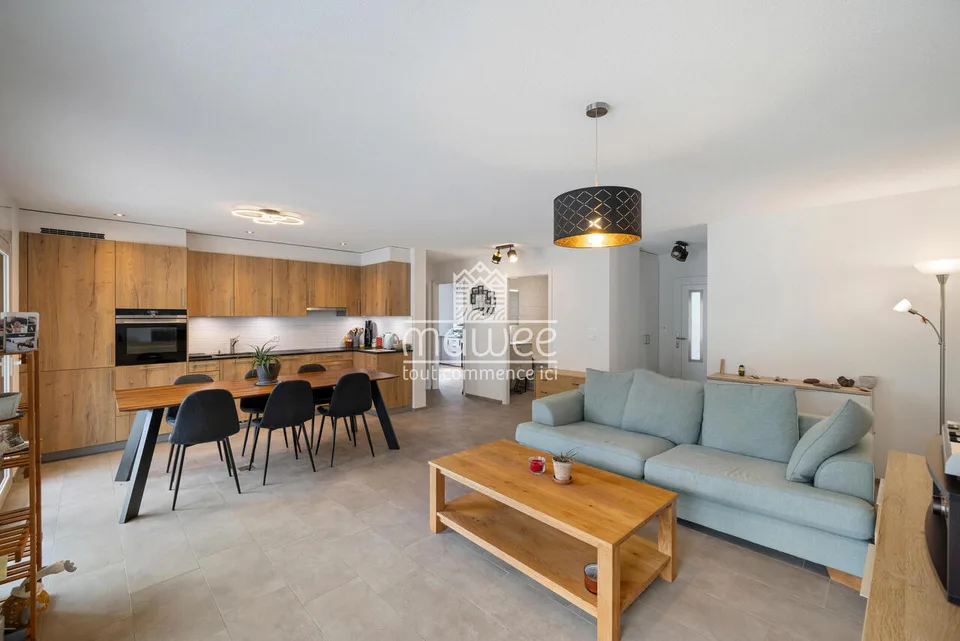 Charmantes 3,5-Zimmer-Wohnung mit Terrasse, Garten und zwei Parkplätzen