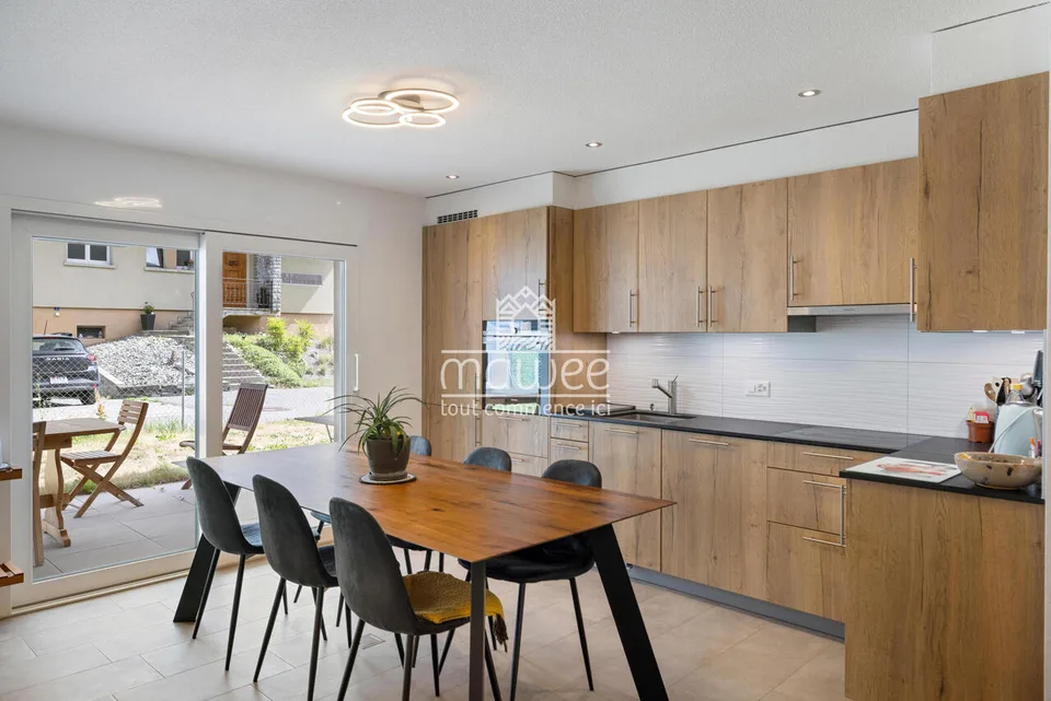 Charmantes 3,5-Zimmer-Wohnung mit Terrasse, Garten und zwei Parkplätzen