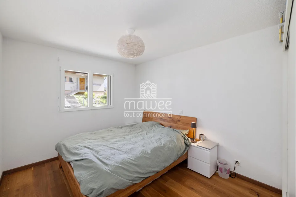 Charmantes 3,5-Zimmer-Wohnung mit Terrasse, Garten und zwei Parkplätzen