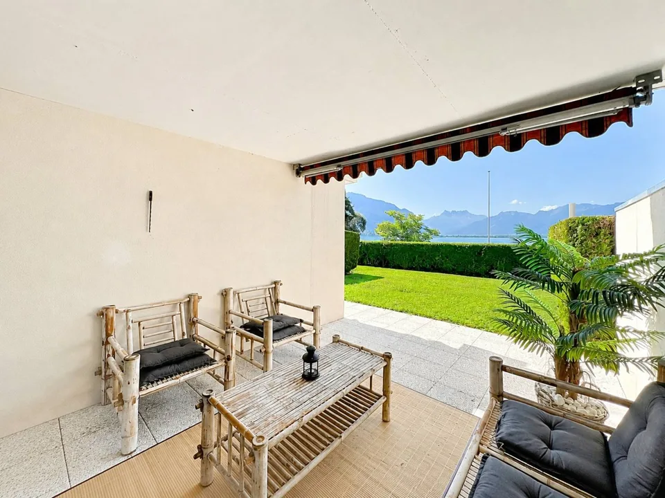 Appartamento di 3.5 locali con terrazza, giardino e vista lago