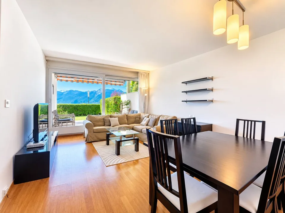 Appartamento di 3.5 locali con terrazza, giardino e vista lago