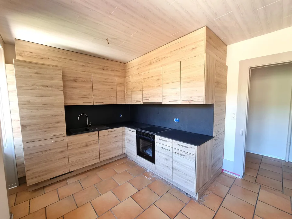 Joli appartement partiellement rénové de 4,5 pièces avec balcon et jardin commun