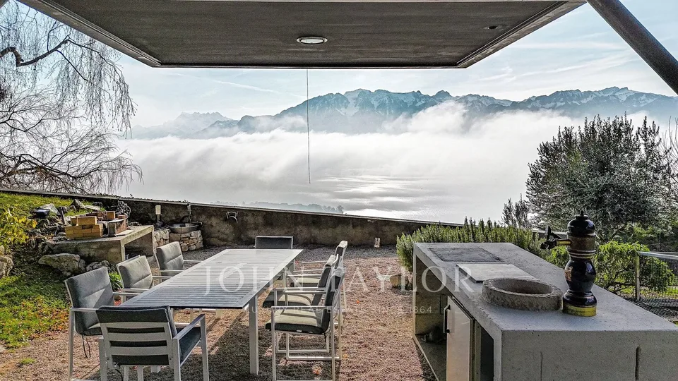 Villa im Architektenstil mit Panoramablick auf See und Alpen – Foto 24 von 25