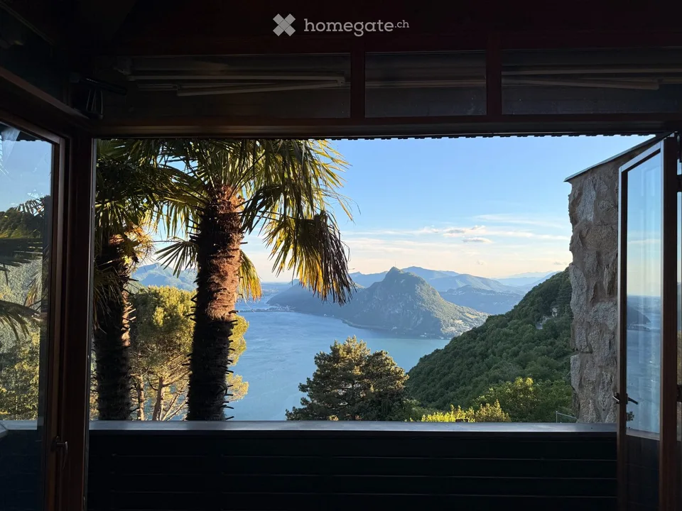 Elegante Villa Unifamiliare a Brè con Piscina e Vista
