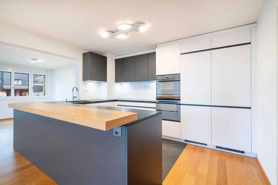 Superba 5,5 locali, 133 m2, magnificamente ristrutturata con ampio balcone