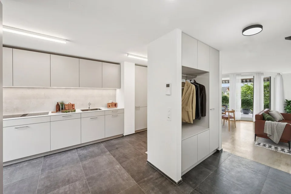 Erstbezug nach Sanierung -  Maisonettewohnung mit Gartensitzplatz