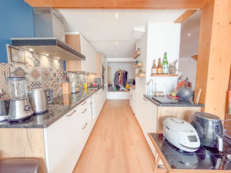 Ampio duplex PPE di 5.5 locali con garage nel cuore di Ste-Croix