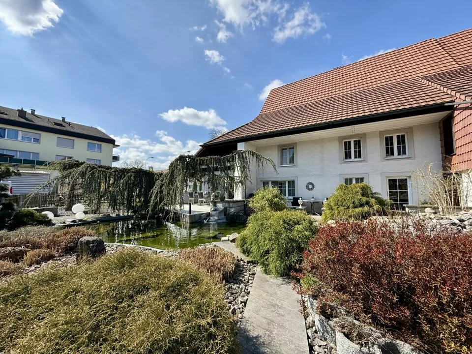 Propriété unique avec espace commercial, jardin paradisiaque et potentiel d'expansion – photo 21 sur 23