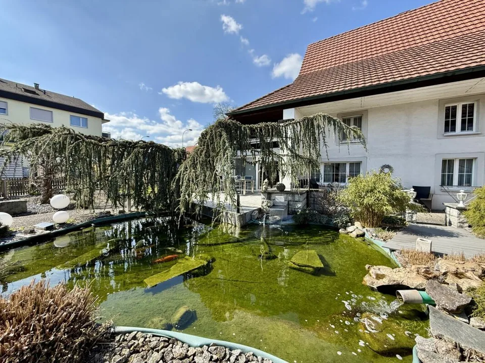 Propriété unique avec espace commercial, jardin paradisiaque et potentiel d'expansion – photo 20 sur 23