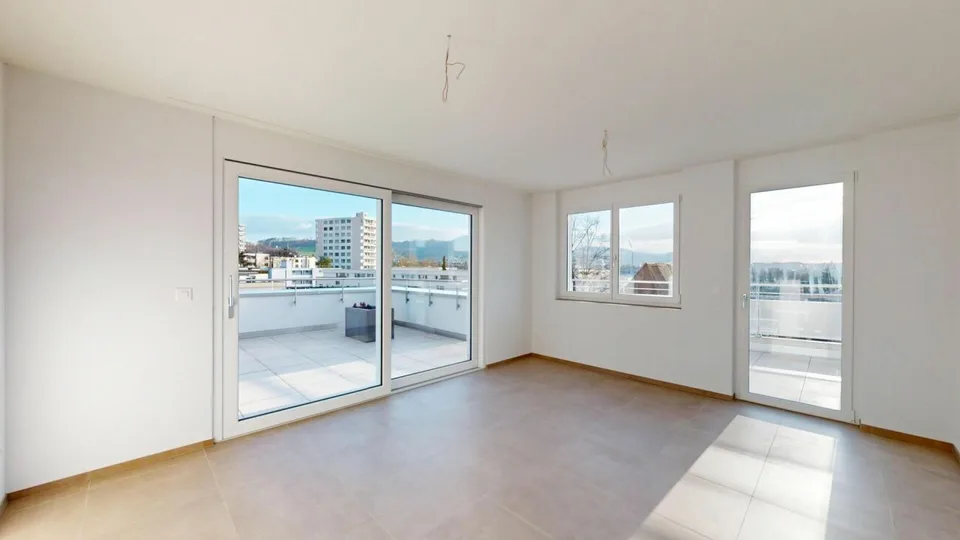 Exclusive 3.5-room attic apartment in the first occupancy with 98 m² sun terrace