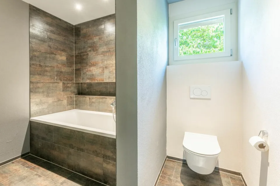 Maison à deux familles attrayante avec 5,5 pièces appartement principal et 2,5 pièces second appartement à vendre – photo 10 sur 22