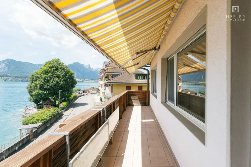 Appartamento vacanze di 3½ locali sulla riva del lago di Thun con area balneare