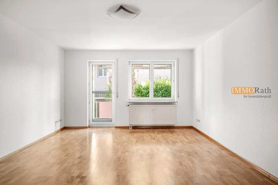 IMMORath.de - Helle 3-Zimmerwohnung mit zwei Stellplätzen