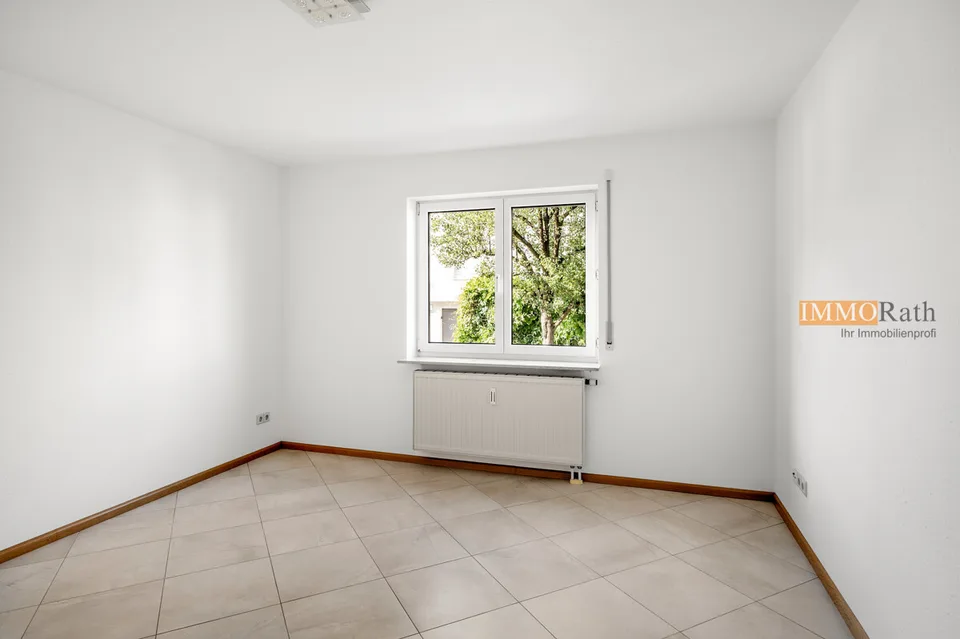 IMMORath.de - Helle 3-Zimmerwohnung mit zwei Stellplätzen