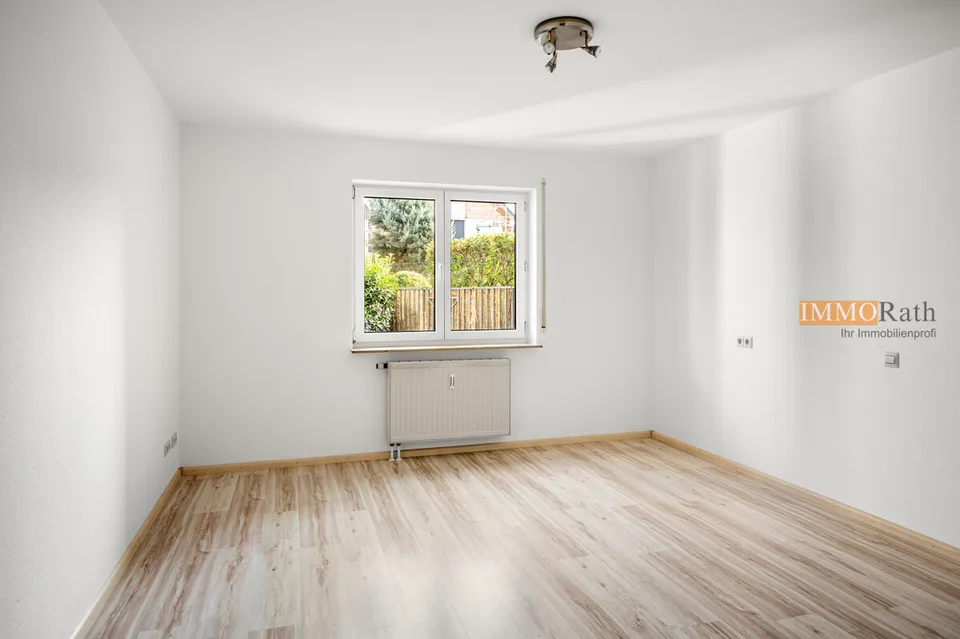 IMMORath.de - Helle 3-Zimmerwohnung mit zwei Stellplätzen
