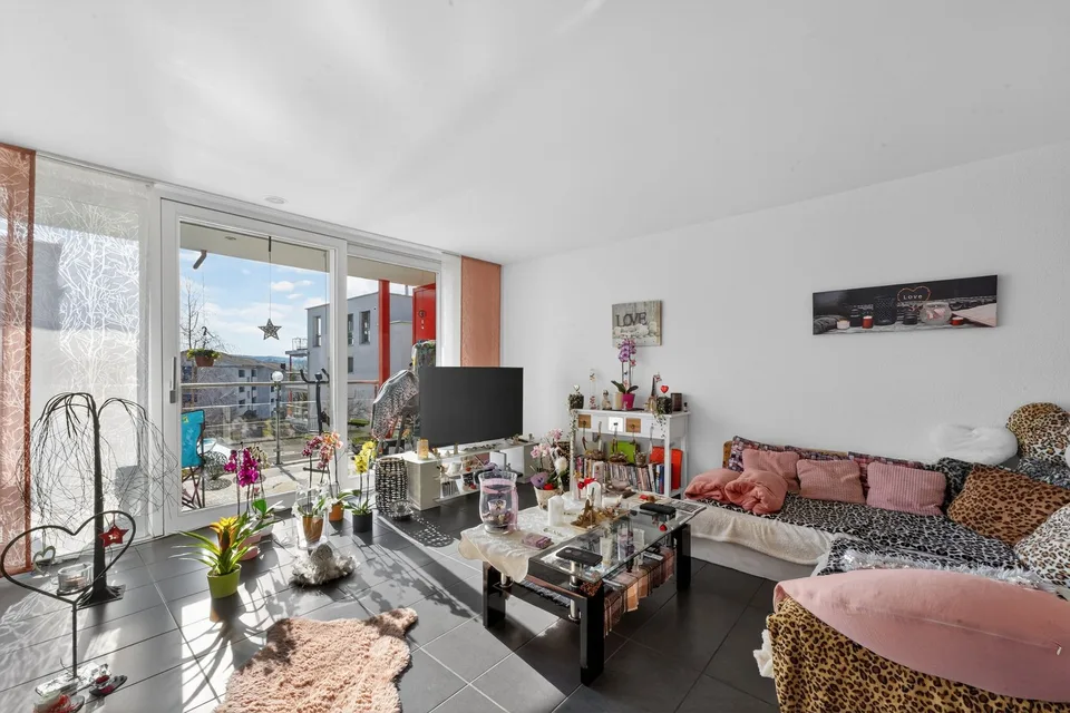 Appartement de jardin ensoleillé de 3,5 pièces avec balcon et grand espace de séjour au jardin