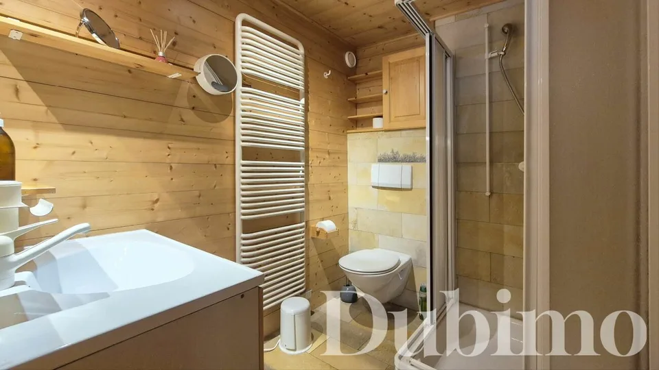 CHALET EMBLEMATIQUE D'EXCEPTION FACE AUX DENTS DU MIDI À CHAMPÉRY