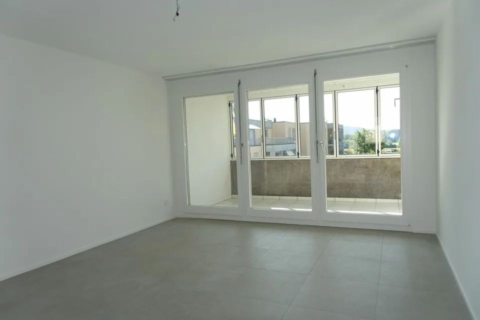 Appartamento di 3,5 locali ristrutturato con balcone e posto auto