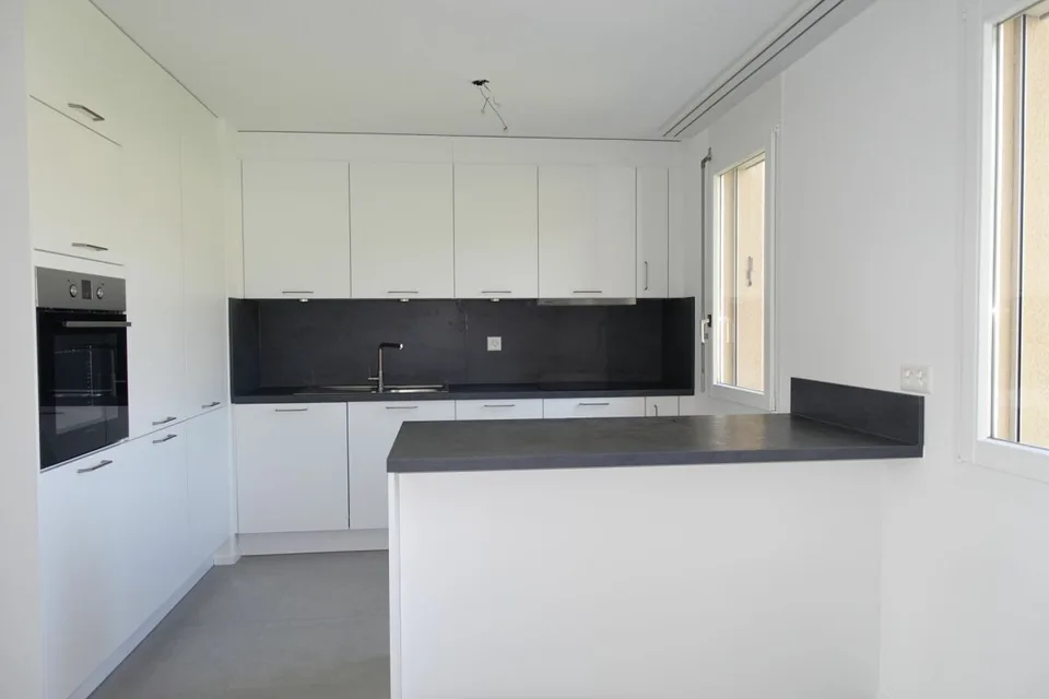 Appartamento di 3,5 locali ristrutturato con balcone e posto auto