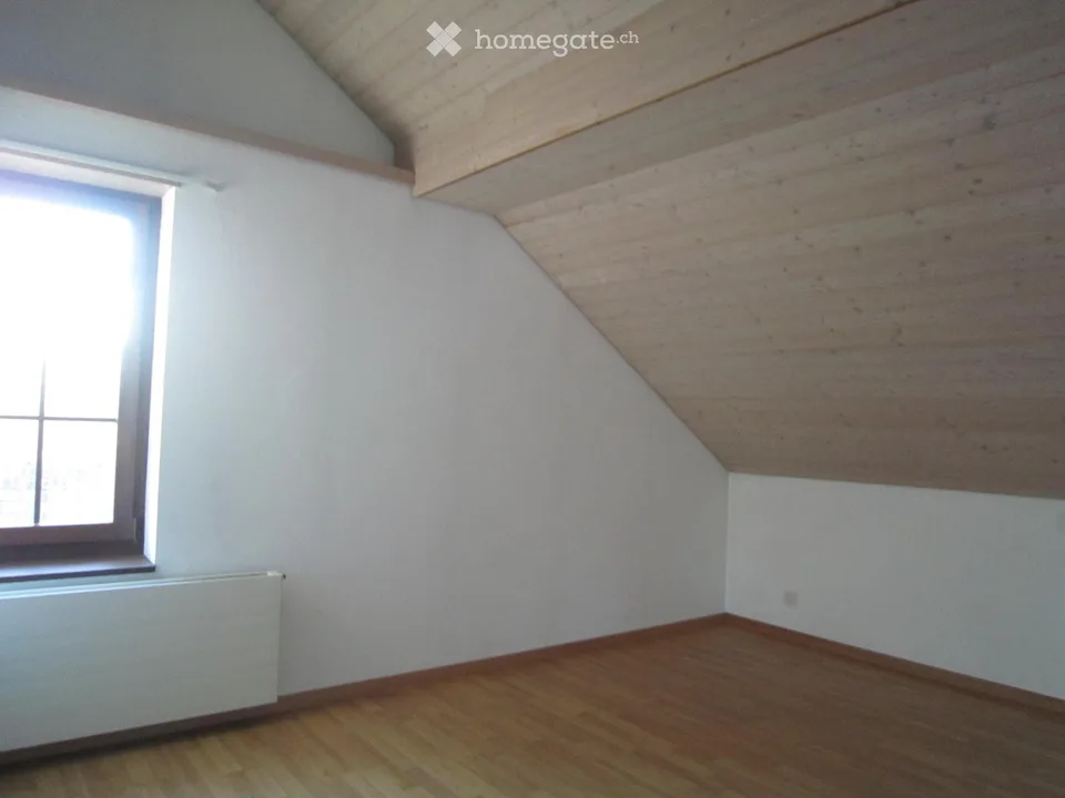 Charmante 2.5-Zimmer-Dachwohnung in Würenlos