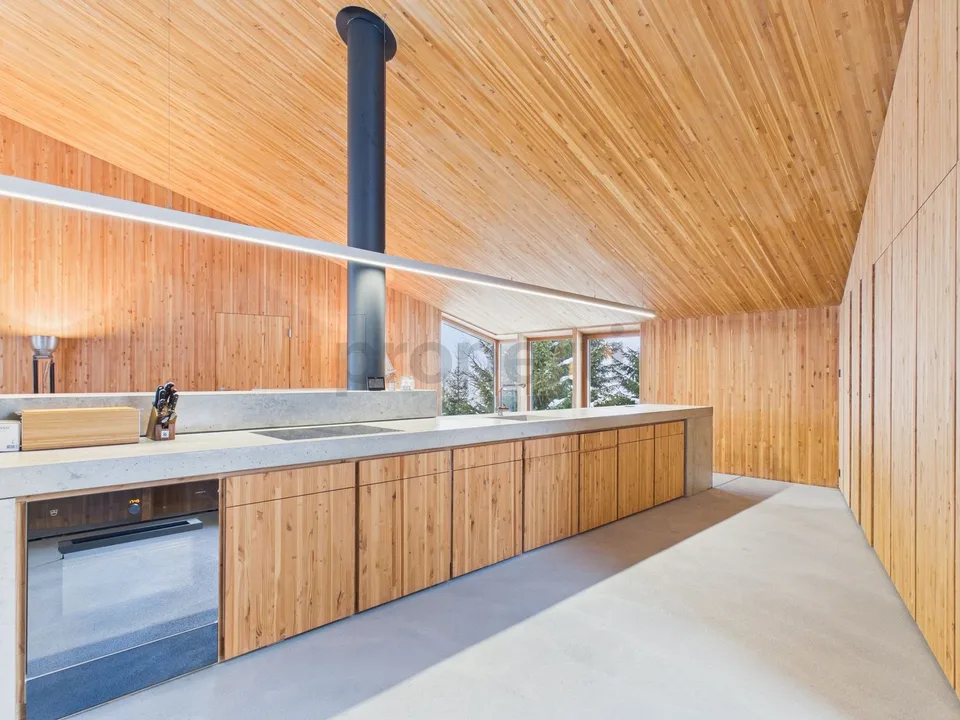 Maison unifamiliale architecturalement remarquable dans un emplacement panoramique de premier ordre dans les Alpes suisses - une seconde maison avec confort de vie et vue lointaine