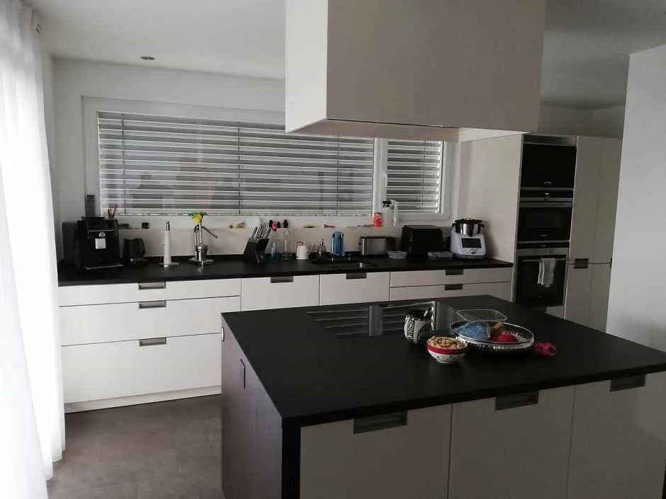 Appartement de jardin exclusif de 4,5 pièces avec double garage et extérieur de rêve