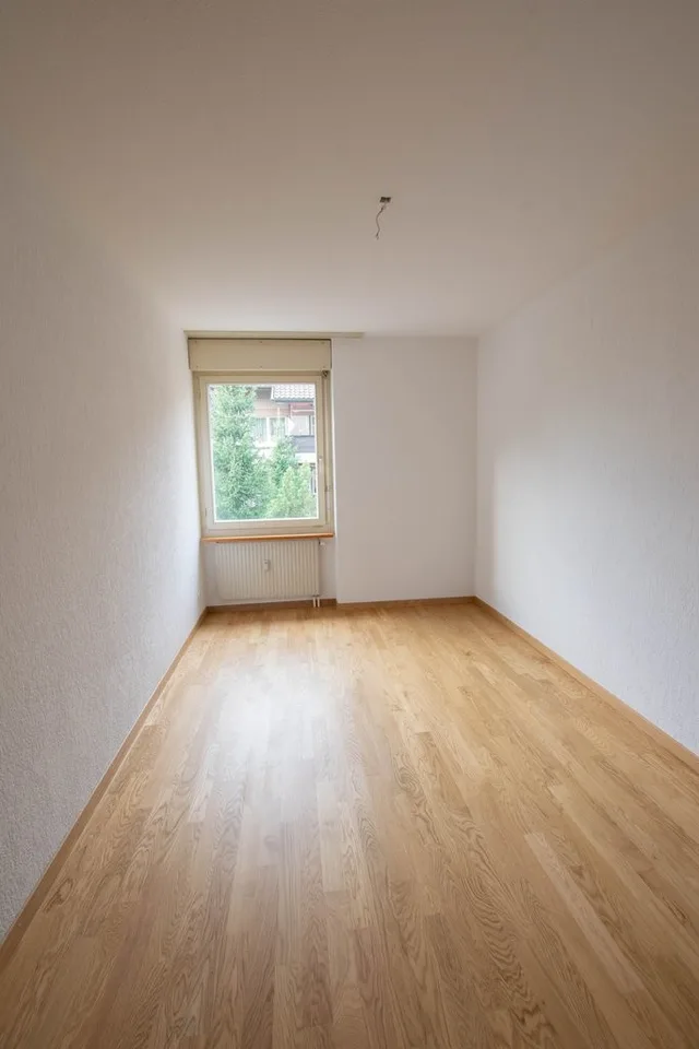 Appartement confortable de 3,5 pièces avec espace de jardin