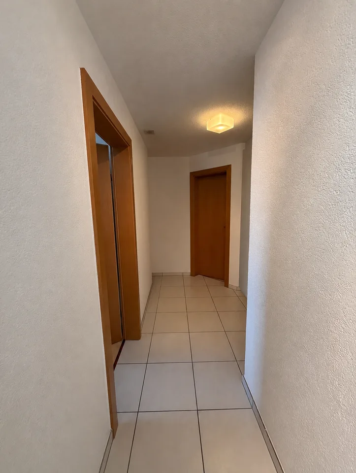 Bright 4.5-room ground-floor apartment with garden seating area
