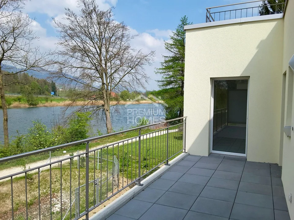 Stylish living with a view of the Aare