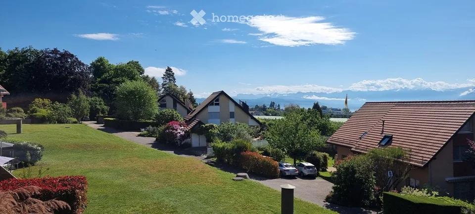 Appartamento di 4,5 locali con vista sulle Alpi e sul lago