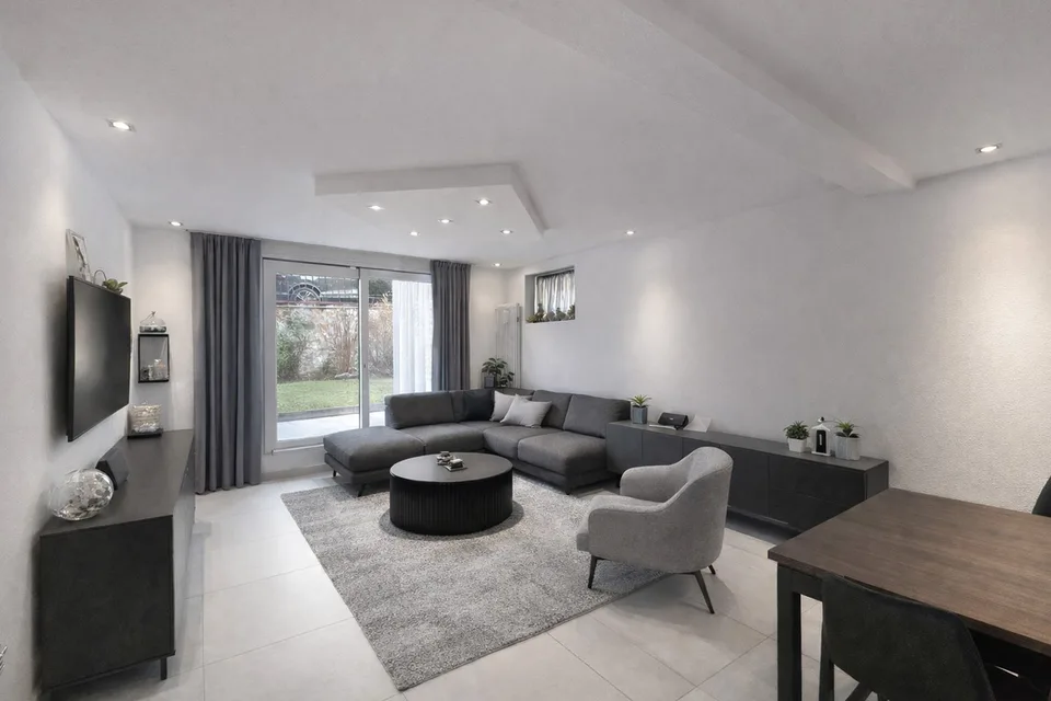 Casa bifamiliare con giardino a Canobbio