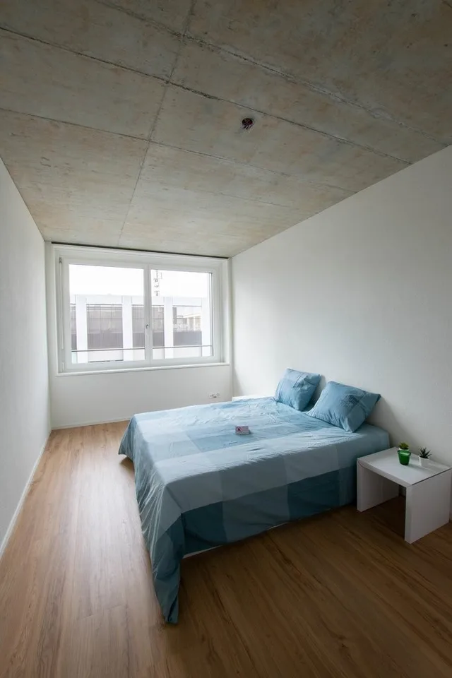 Appartement moderne 3 pièces avec terrasse sur le toit partagée