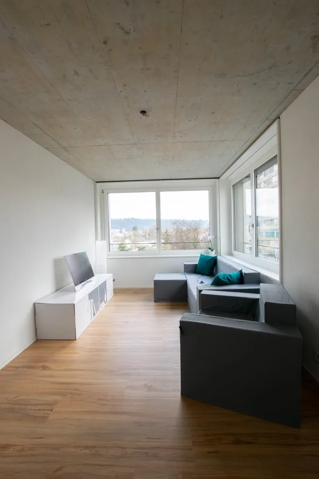 Appartement moderne 3 pièces avec terrasse sur le toit partagée