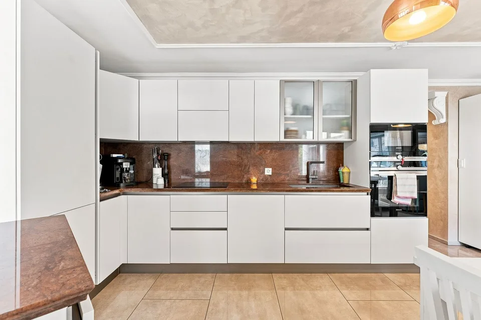 Maison mitoyenne de deux familles avec 2 appartements à vendre à Auw
