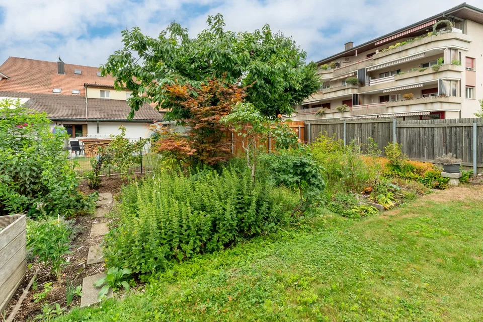 Appartement en propriété charmant avec part de jardin et vue sur le vert – photo 11 sur 12