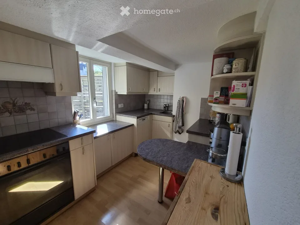 Incantevole appartamento maisonette di 4 locali con balcone e giardino a Gossau ZH